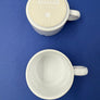 Vaisselle SABENA de la Business Class. La porcelaine est décorée de « L'oiseau de ciel » de René Magritte. PRIX à la pièce.