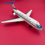 Douglas DC-9 « battery operated » – Nomura Toys (Japon, vers 1966-1970) — 36 L cmx E 37 cm (échelle approximative 1:60) —