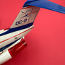 Douglas DC-9 « battery operated » – Nomura Toys (Japon, vers 1966-1970) — 36 L cmx E 37 cm (échelle approximative 1:60) —