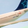 Airbus A310-300 - 🇨🇦 Air Transat - maquette de bureau en plastique avec support – 1:200 - 23 × 23 cm