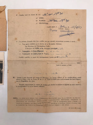 Enveloppe contenant divers documents ( expéditeur : André Delbecque )